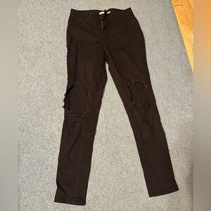 721 High Rise Skinny Jeans with knee rips. Size 28